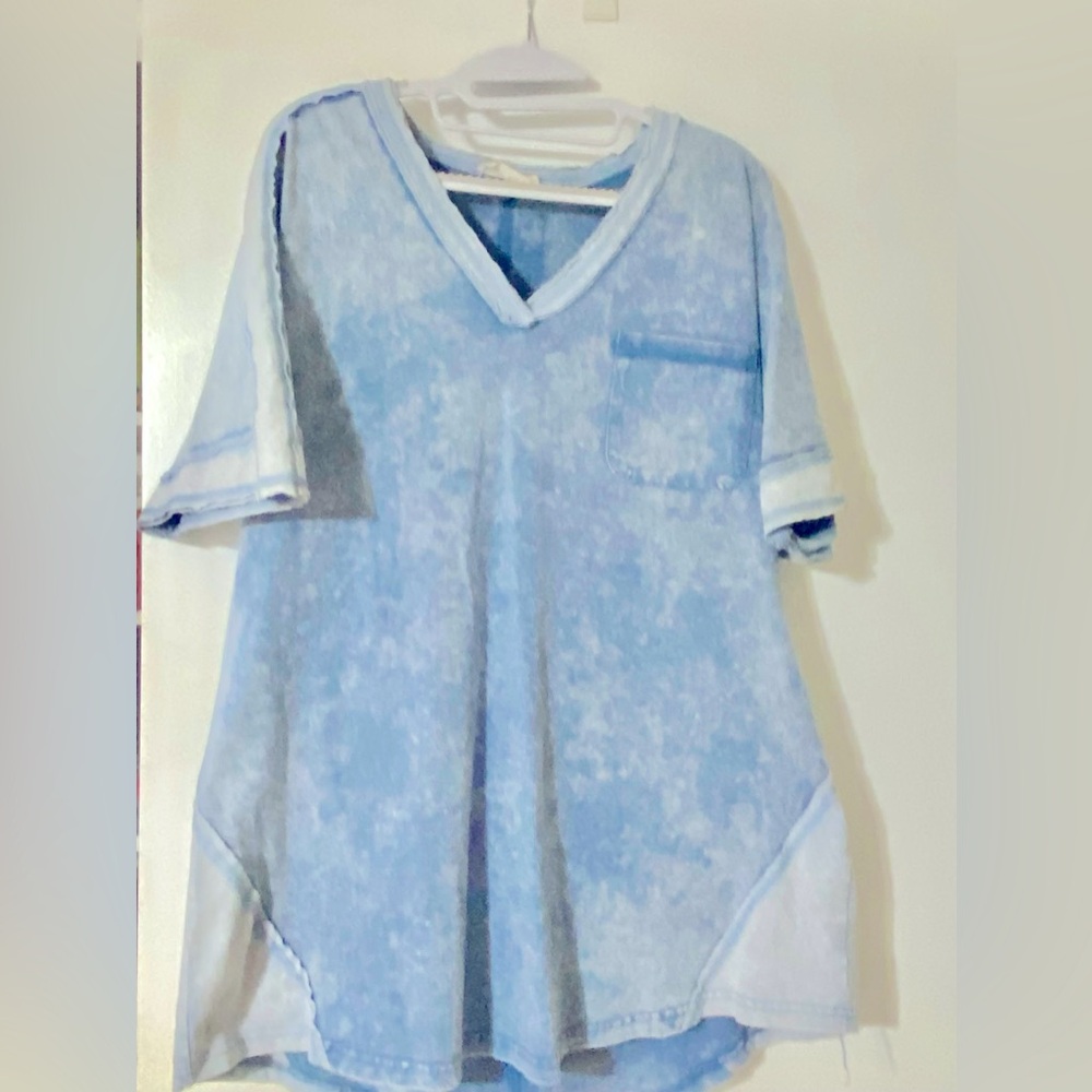 Brand: New In… mini dress in a light denim blue with room to size down one.